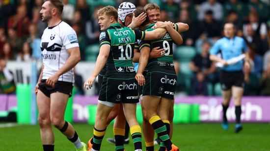 Northampton Saints celebrate scoring a try