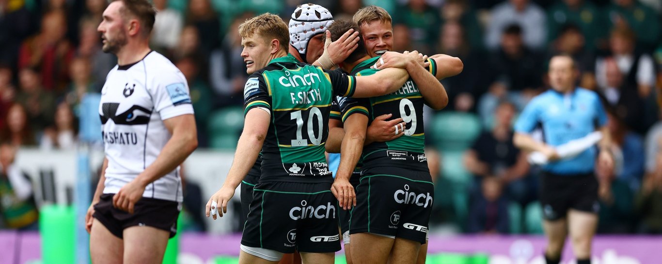 Northampton Saints celebrate scoring a try
