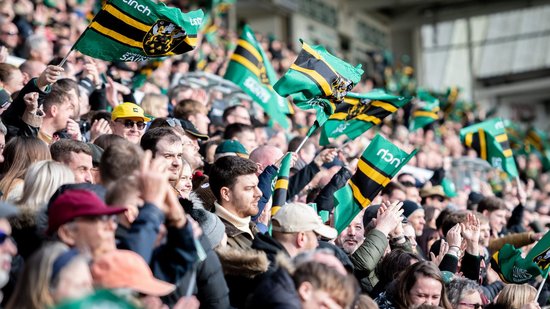 Supporters wave flags at Franklin’s Gardens