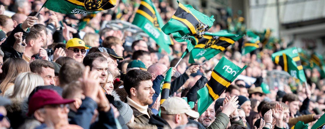 Supporters wave flags at Franklin’s Gardens