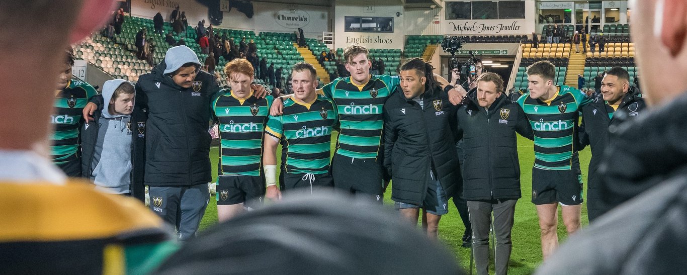 Northampton Saints huddle after a match