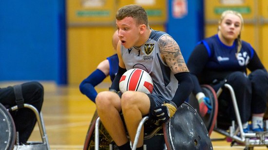 Saints Wheelchair Rugby side in action