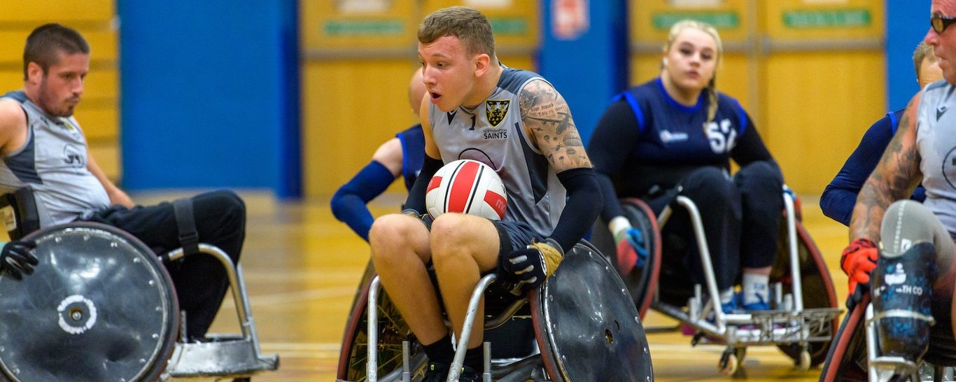 Saints Wheelchair Rugby side in action