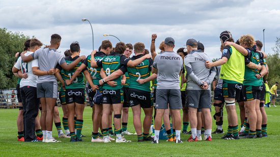 Northampton Saints Under-18s huddle before a game